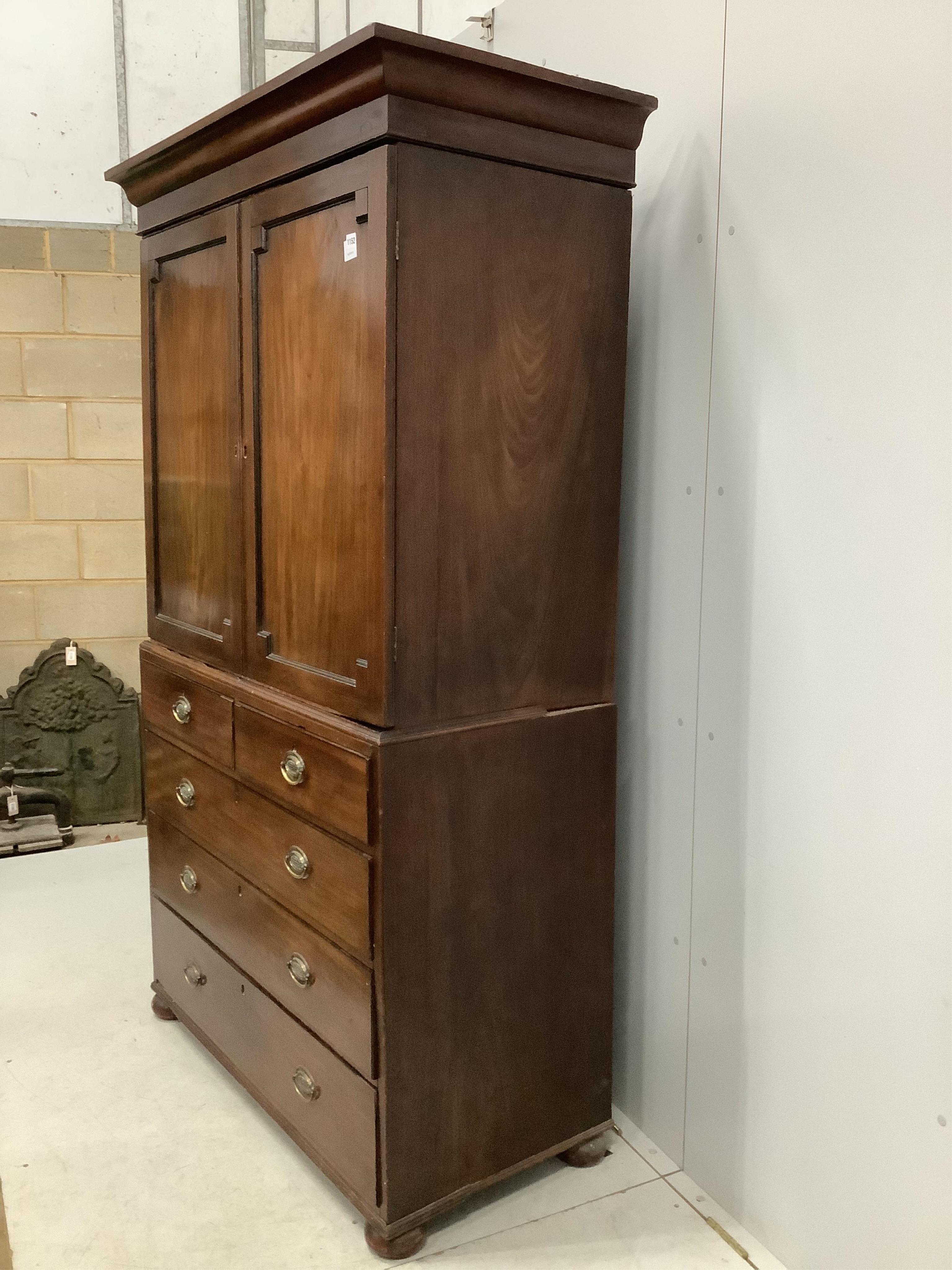 A Regency mahogany linen press, width 114cm, depth 53cm, height 200cm. Condition - poor